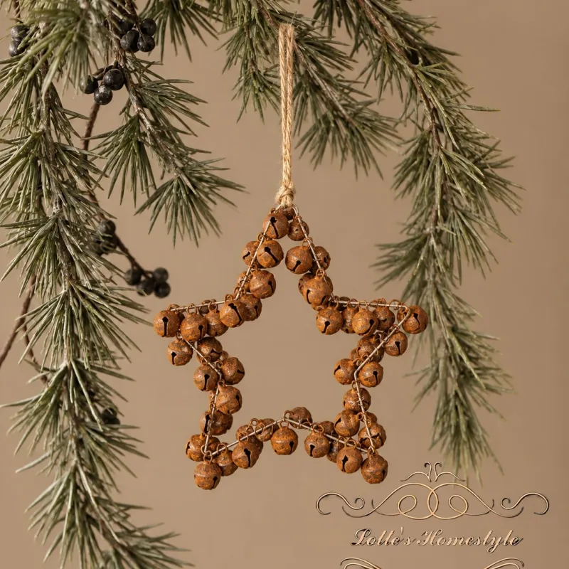 Roest ster hanger met belletjes